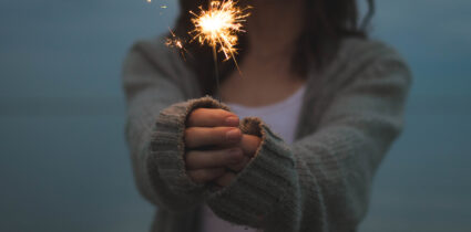 Image of a person holding a sparkler